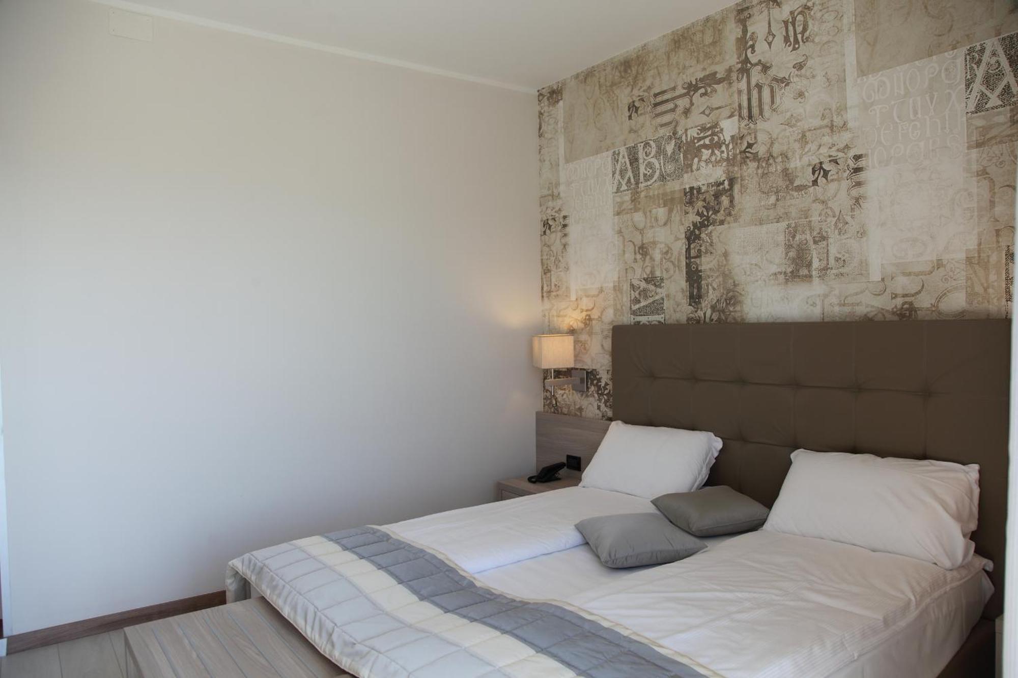 Hotel Monaco Каорле Номер фото